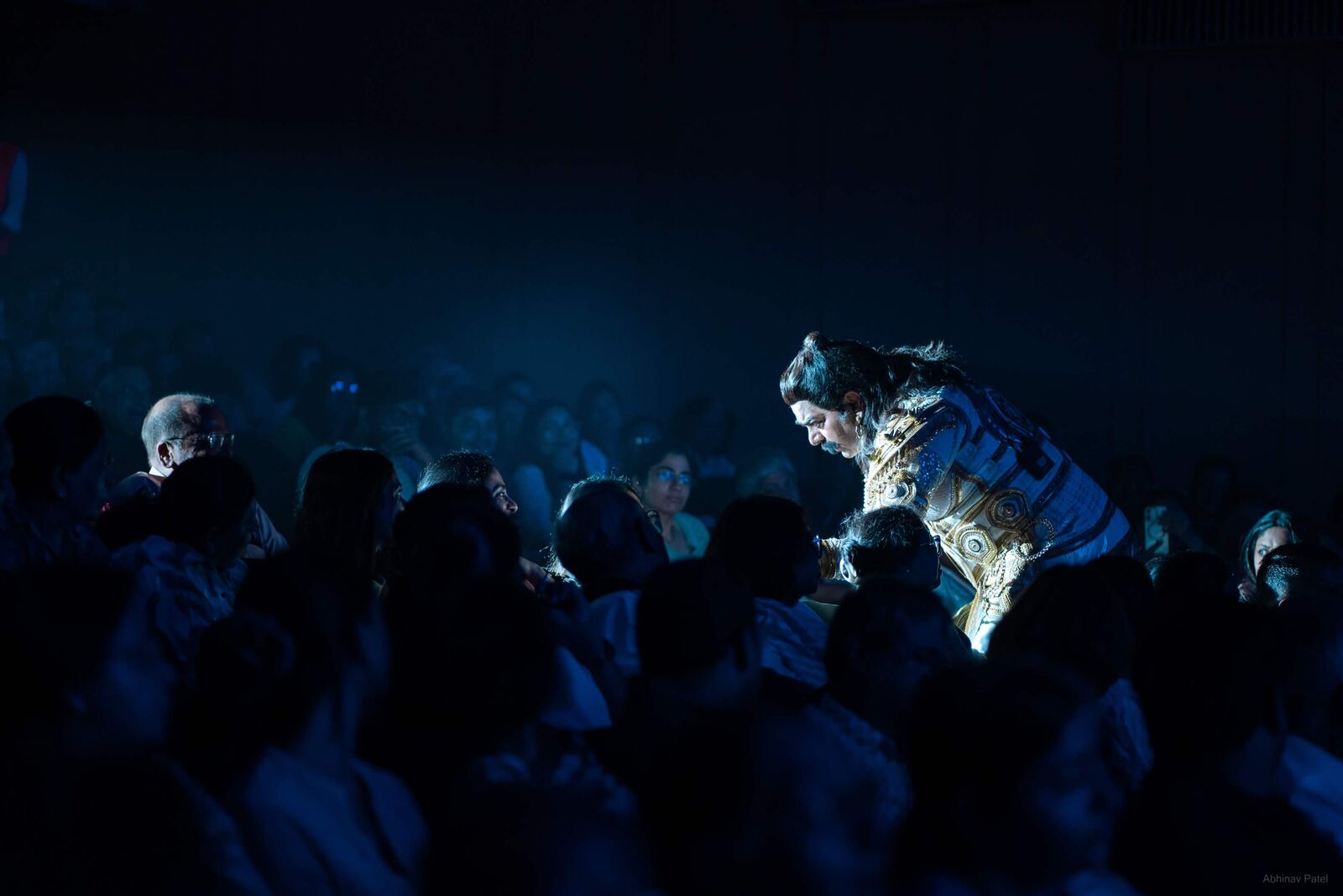 Costumed performer interacting with the audience